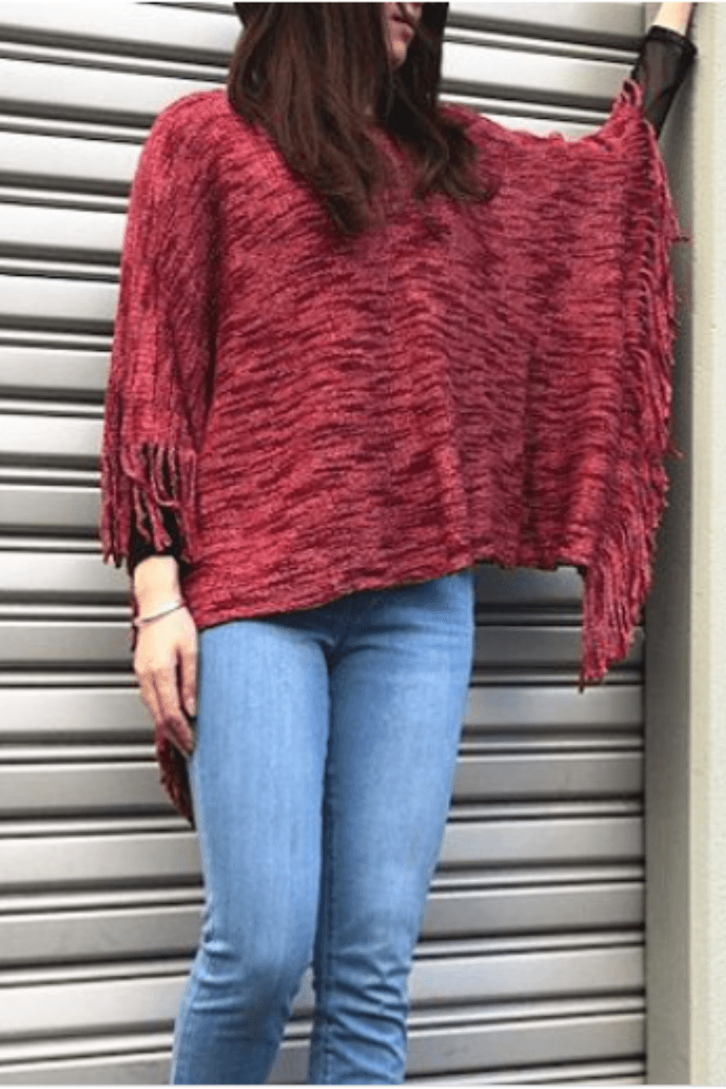 Short Natural Ponch with Fringe Detail.