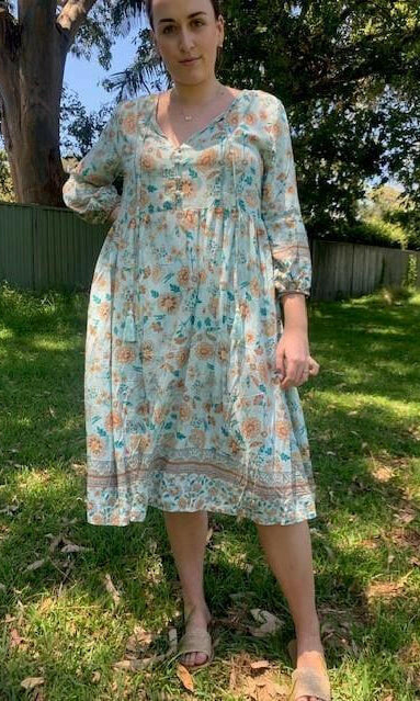 D8640BAQ Silver Wishes Aqua Floral Long- Sleeved Dress.