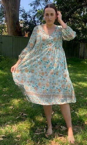 D8640BAQ Silver Wishes Aqua Floral Long- Sleeved Dress.