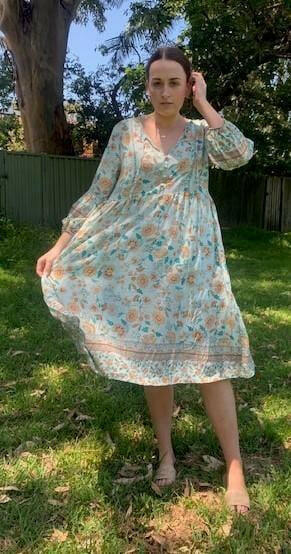 D8640BAQ Silver Wishes Aqua Floral Long- Sleeved Dress.