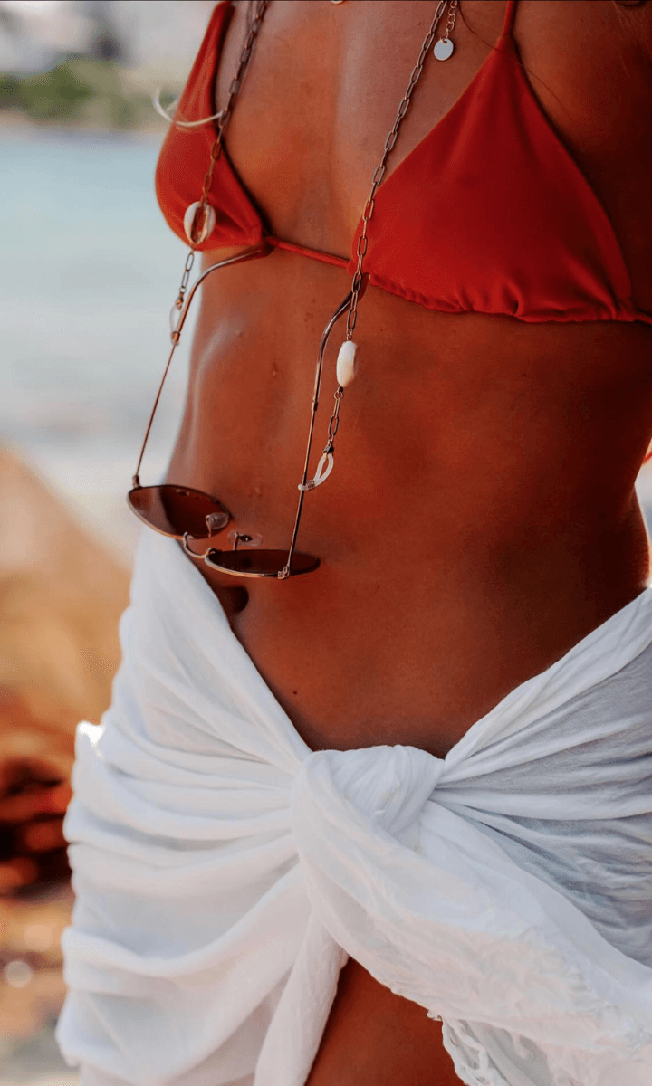 The Sunshine Collective Cowrie Shell Sunnies Chain.