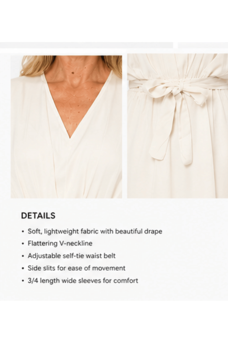 White dress with details on fabric, neckline, waist belt, side slits, and sleeves.