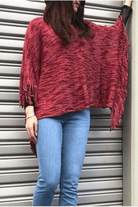 Short Natural Ponch with Fringe Detail.