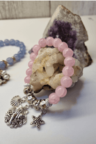 Pale Pink Glass & Silver Plated Bracelet Clam Shell.