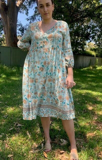 D8640BAQ Silver Wishes Aqua Floral Long- Sleeved Dress.