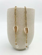 The Sunshine Collective Cowrie Shell Sunnies Chain.