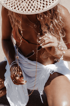 The Sunshine Collective Cowrie Shell Sunnies Chain.